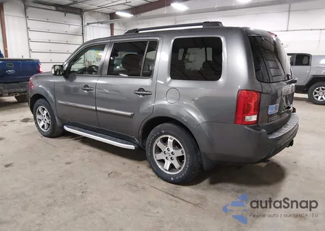 2010 Honda Pilot Touring z USA, uszkodzony, nr VIN 5FNYF4H99AB024599